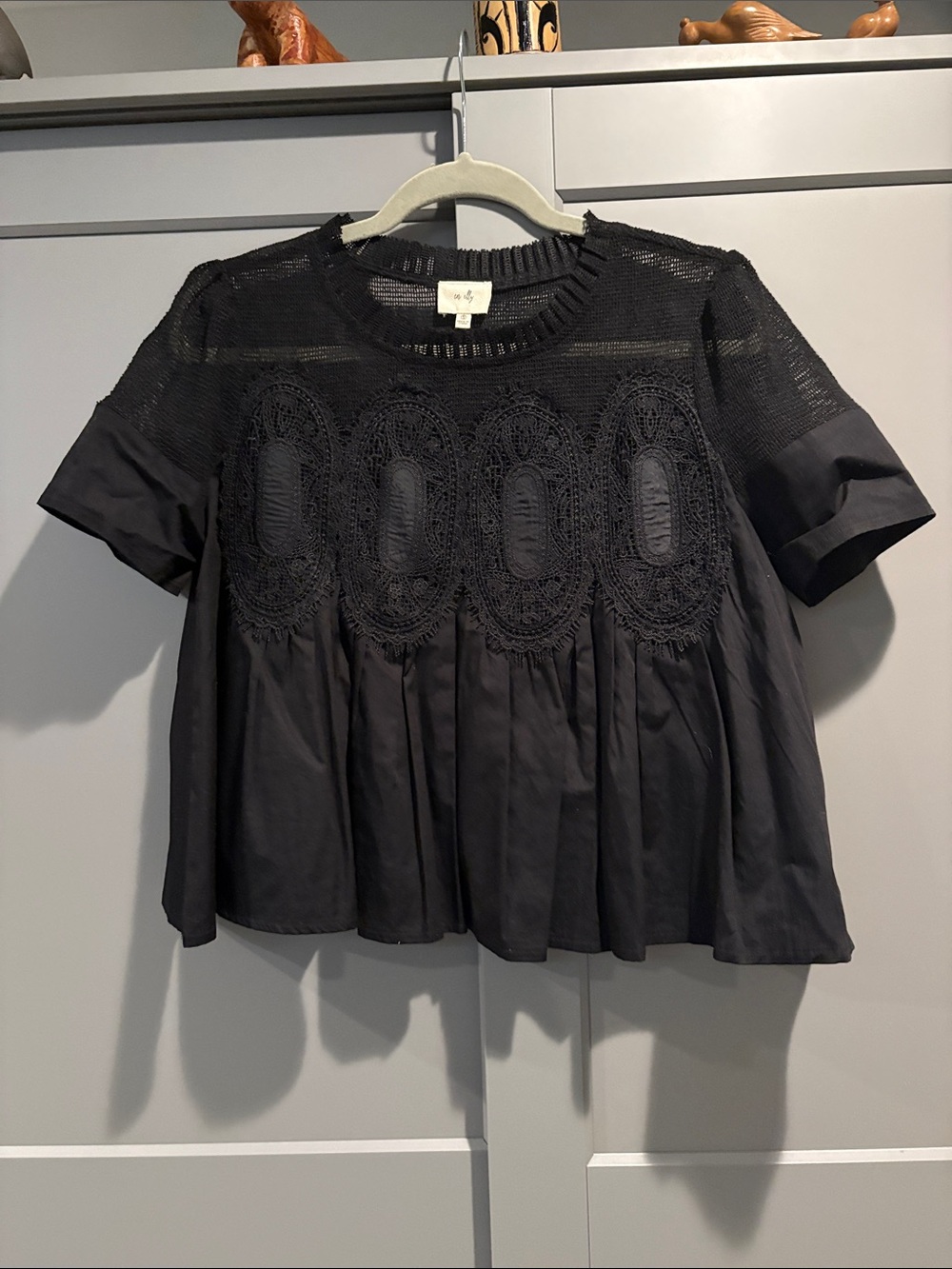 Anthropologie black blouse. Lace inset. Size Small